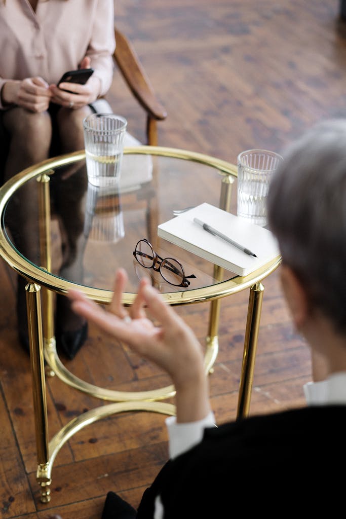 Woman self-soothing with journal – can’t afford therapy support